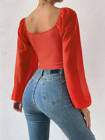 Blusa corta escote corazón con cordón de manga farol