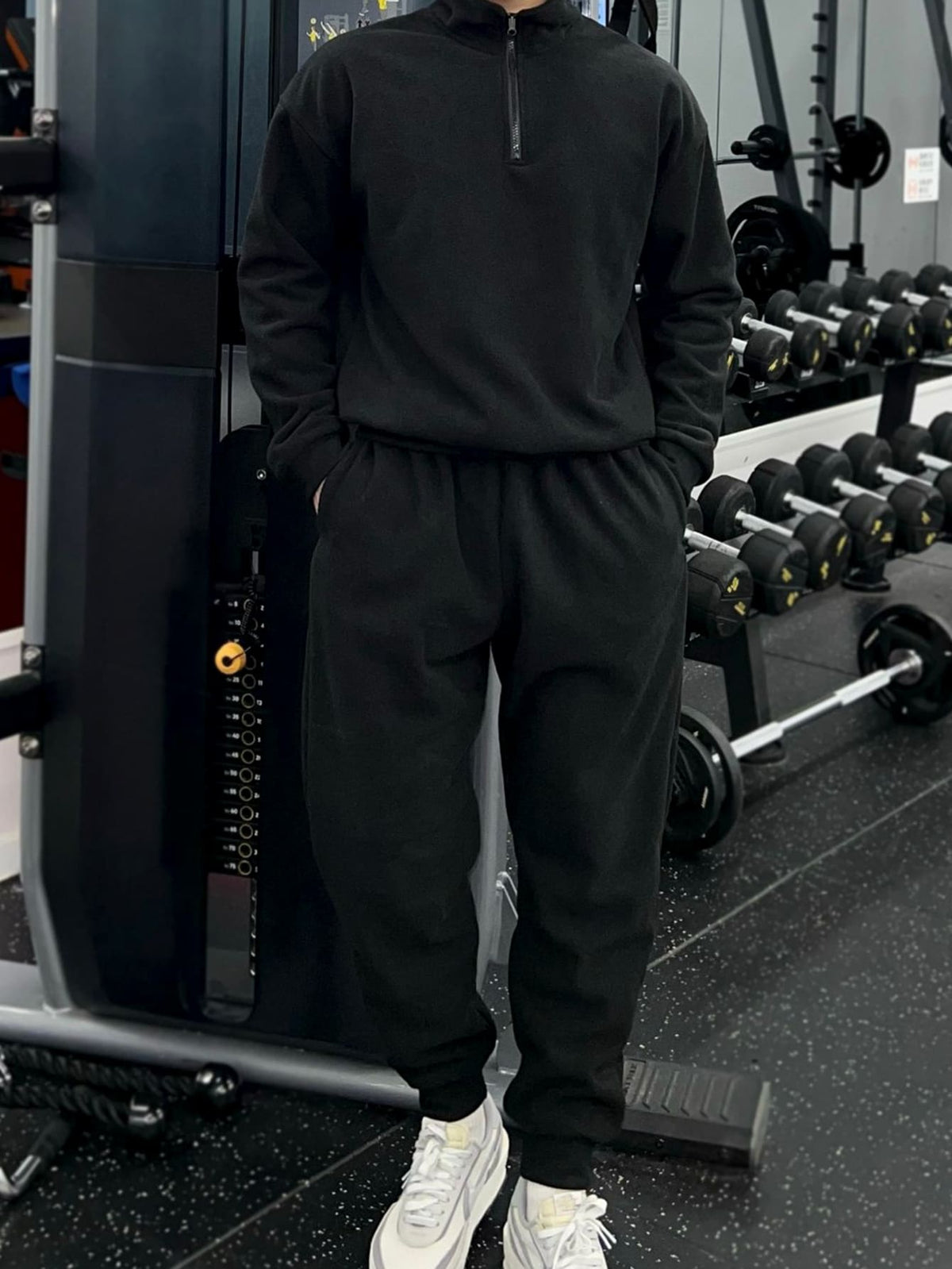 Pantalones deportivos con sudadera unicolor con cremallera media