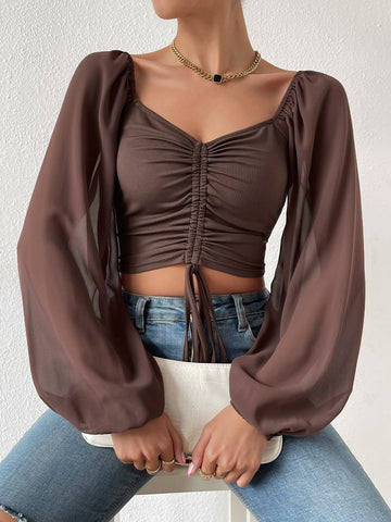 Blusa corta escote corazón con cordón de manga farol