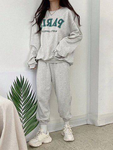 Conjunto de Pantalones deportivos con sudadera con estampado de slogan de hombros caídos