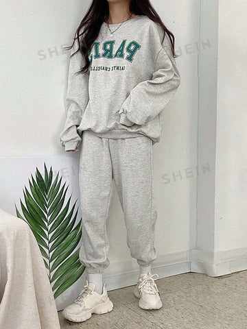 Conjunto de Pantalones deportivos con sudadera con estampado de slogan de hombros caídos