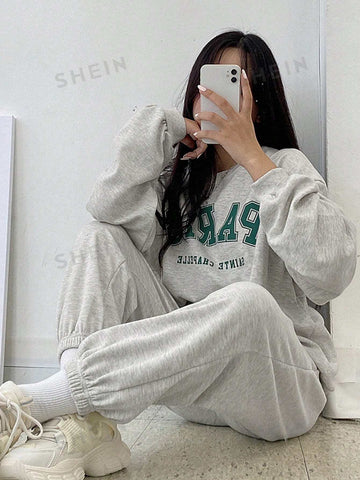 Conjunto de Pantalones deportivos con sudadera con estampado de slogan de hombros caídos