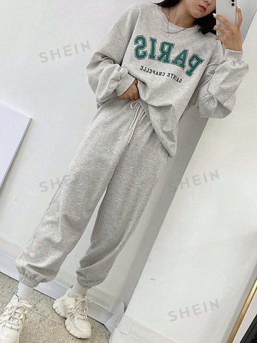Conjunto de Pantalones deportivos con sudadera con estampado de slogan de hombros caídos