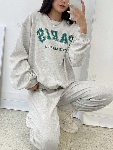 Conjunto de Pantalones deportivos con sudadera con estampado de slogan de hombros caídos