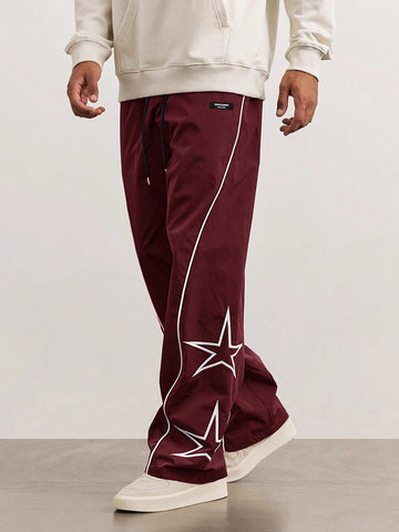 Pantalones deportivos casuales para hombres con patrón de estrellas, franja lateral, corte holgado, cintura con cordón