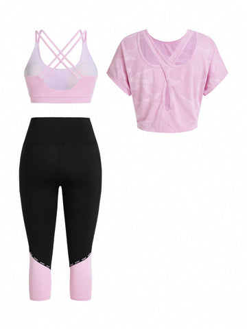 Conjunto deportivo de dos piezas de unicolor que incluye camiseta sin mangas, camiseta de manga corta y mallas