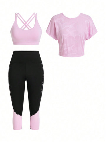Conjunto deportivo de dos piezas de unicolor que incluye camiseta sin mangas, camiseta de manga corta y mallas