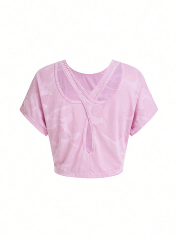 Conjunto deportivo de dos piezas de unicolor que incluye camiseta sin mangas, camiseta de manga corta y mallas