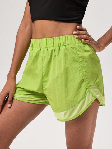 Pantalones cortos de yoga de doble capa para mujer de unicolor con bolsillos y función anti-luz