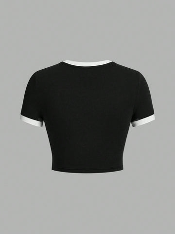 Camiseta de manga corta casual con cuello redondo y letra impresa y estrella de cinco puntas