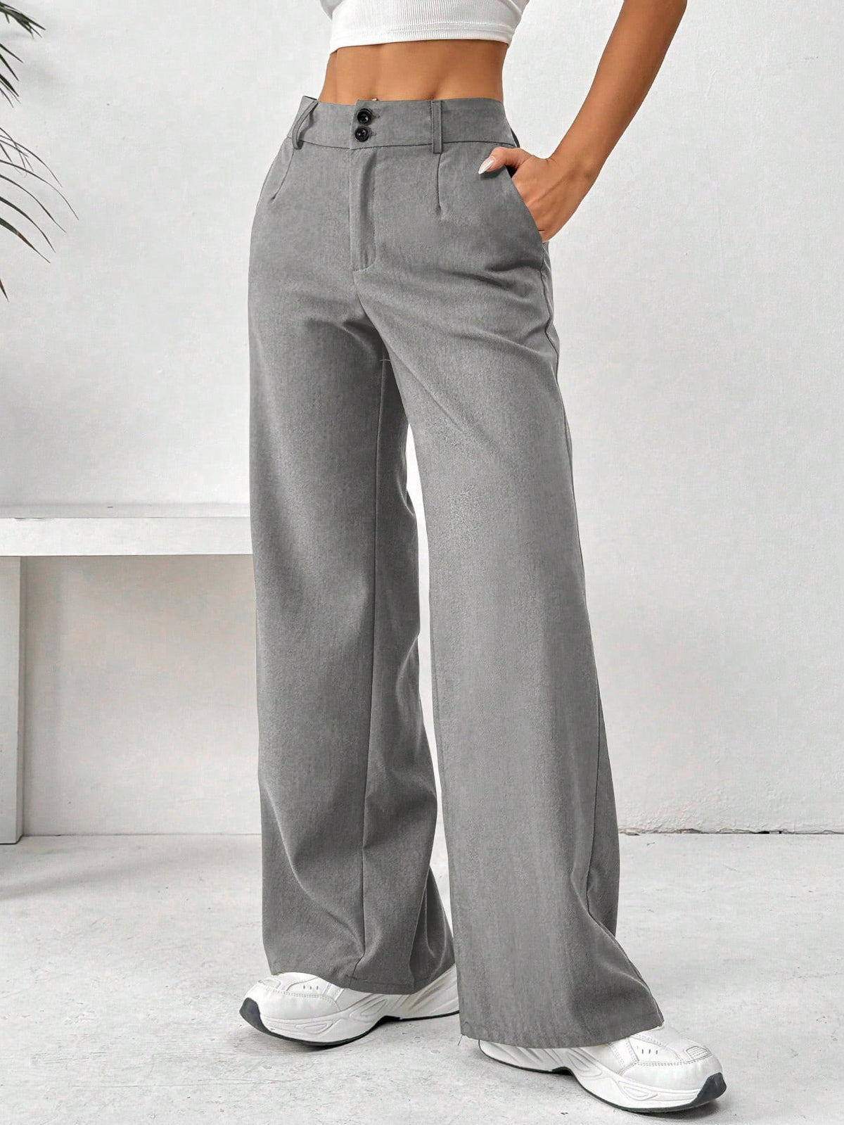 Pantalones casuales de pierna ancha con botones delanteros y bolsillo de unicolor