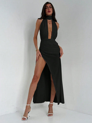 Vestido de cuello en pico, cintura anudada y bajo con abertura