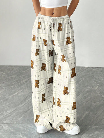 Pantalones anchoscon estampado y cintura con cordón