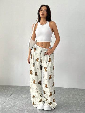 Pantalones anchoscon estampado y cintura con cordón