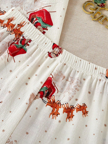 Conjunto de pijama de manga corta y pantalones cortos con estampado navideño