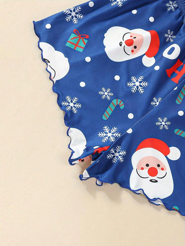 Conjunto de pijama con diseño de Papá Noel y copos de nieve