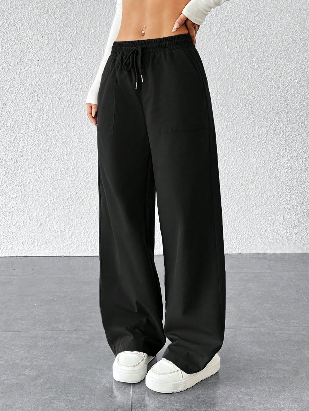 Pantalones sueltos con cintura ajustable, versátiles para hacer deporte
