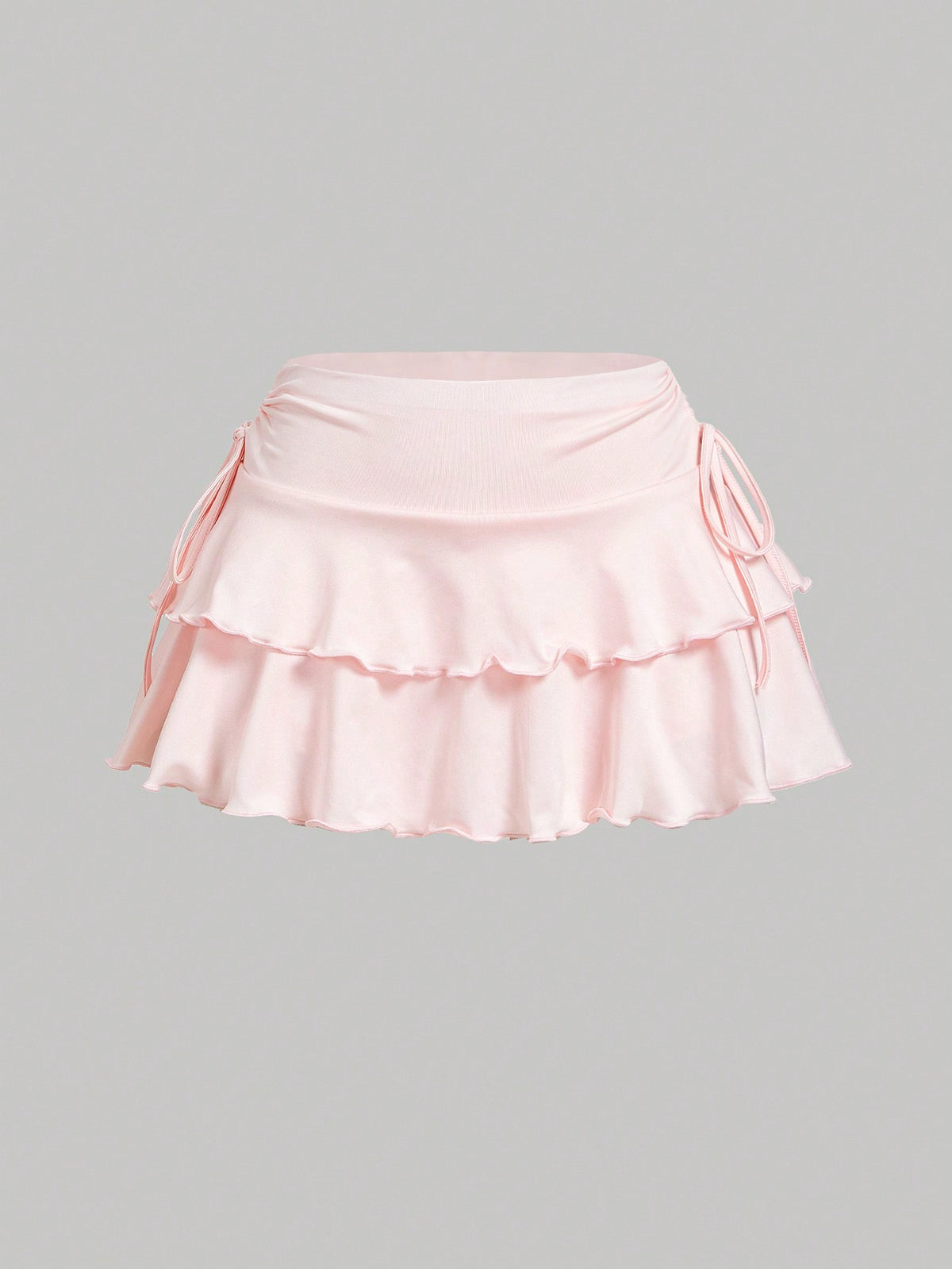 Falda  unicolor con detalles de ajuste con cordón y dobleces