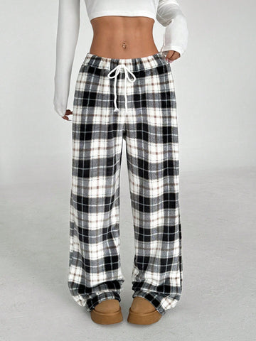 Pantalones rectos holgados con estampado gráfico de peluche navideño