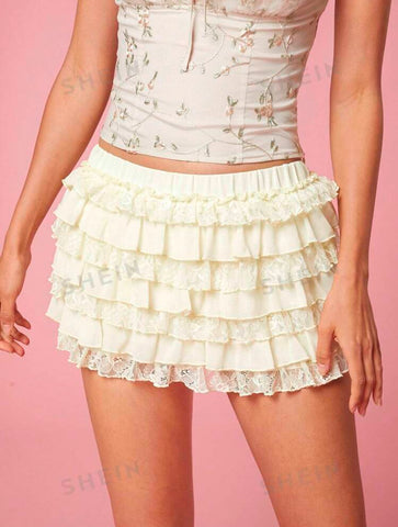 Falda short encaje crema