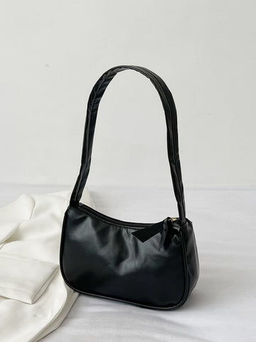 Bolso baguette minimalista