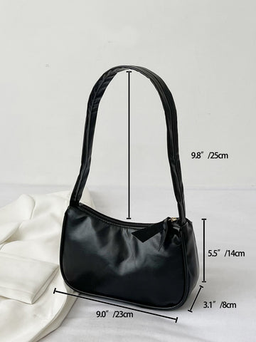 Bolso baguette minimalista