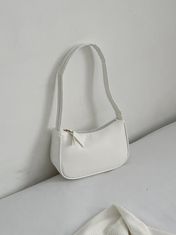 Bolso baguette minimalista