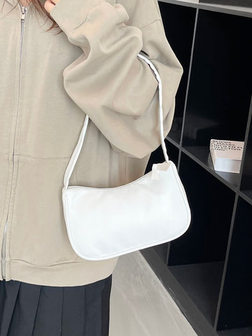 Bolso baguette minimalista