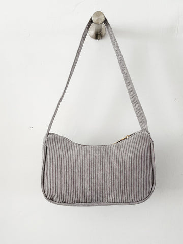 Bolso baguette de pana minimalista