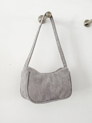 Bolso baguette de pana minimalista