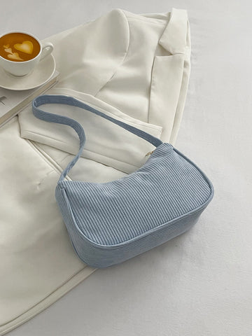 Bolso baguette de pana minimalista