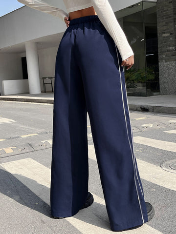 Pantalones de pierna ancha de talle alto con costura