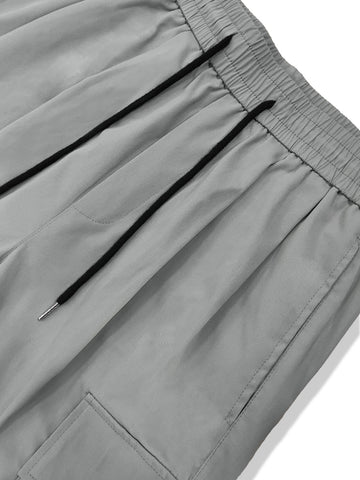 Pantalones cargo con bolsillo lateral con solapa de cintura con cordón