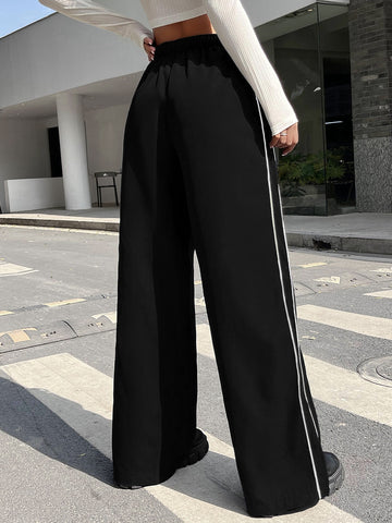 Pantalones de pierna ancha de talle alto con costura