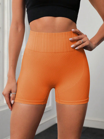 Shorts deportivos unicolor de cintura ancha